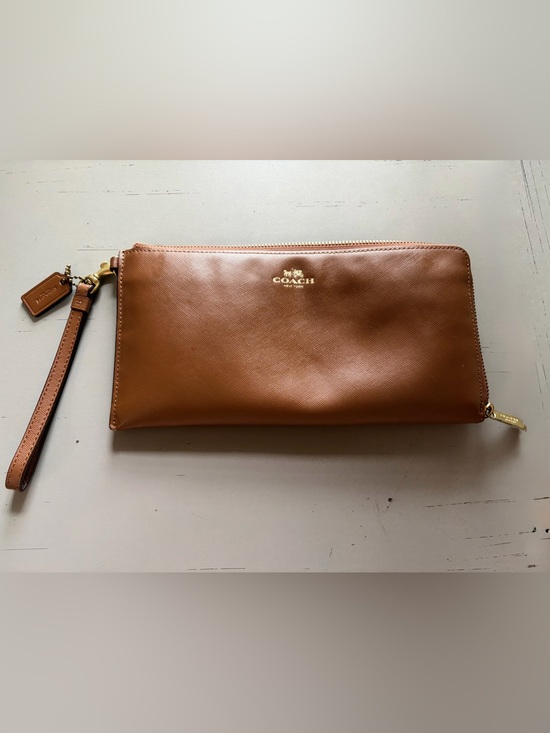 Coach Handbags - Coach Tan Leather Zip Pouch with Gold Logo